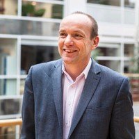 Dr. Neil Churchill, OBE